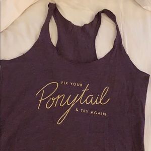 Purple racerback workout tank.